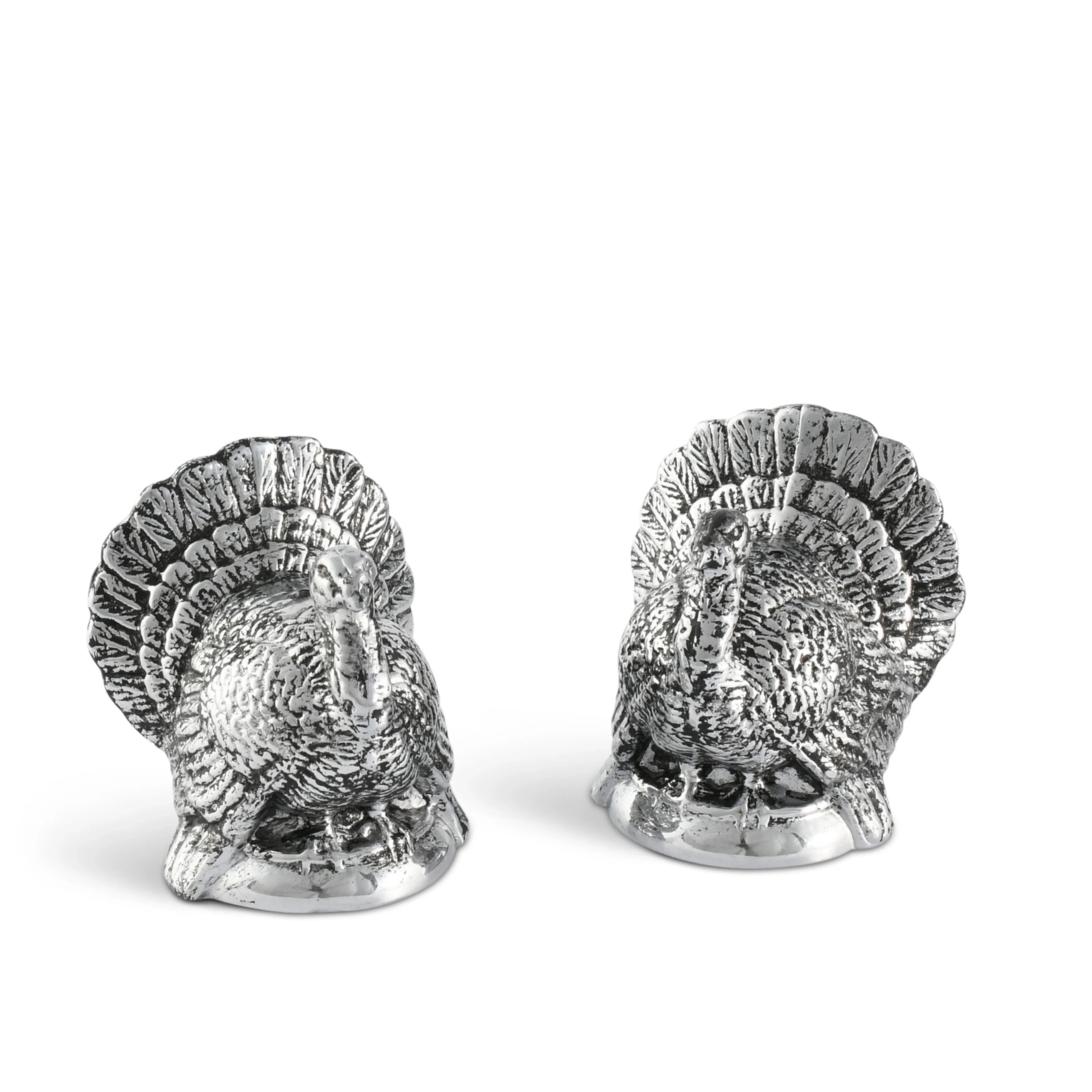 Two silver turkey-shaped salt and pepper shakers on a white background