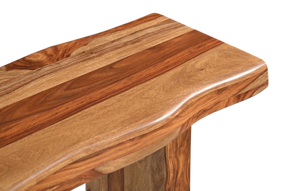 Close-up of natural live edge Sheesham wood grain on Sierra sofa table