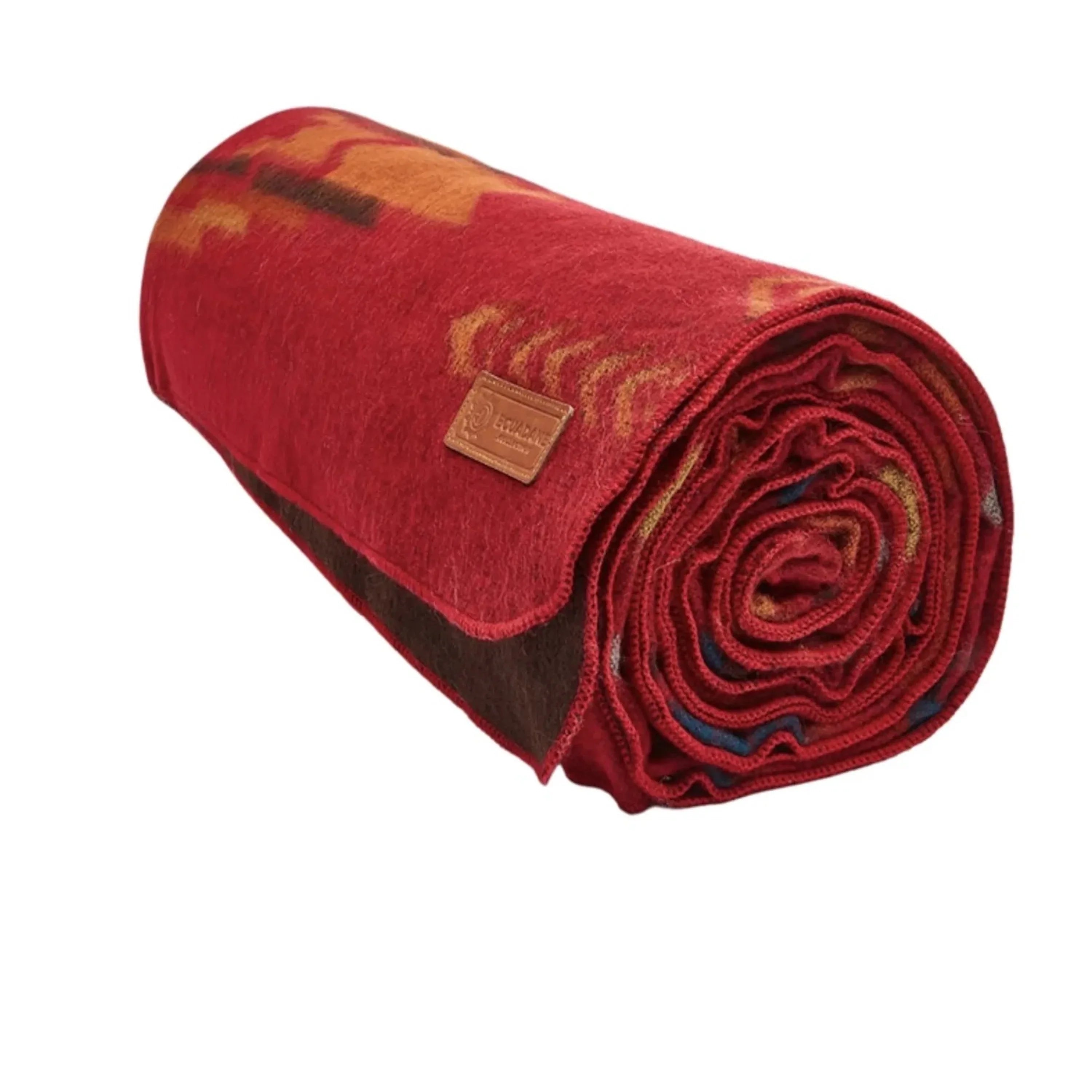 Corazon Wildfire Southwestern Queen Blanket in red and patterns rolled up - Your Western Decor