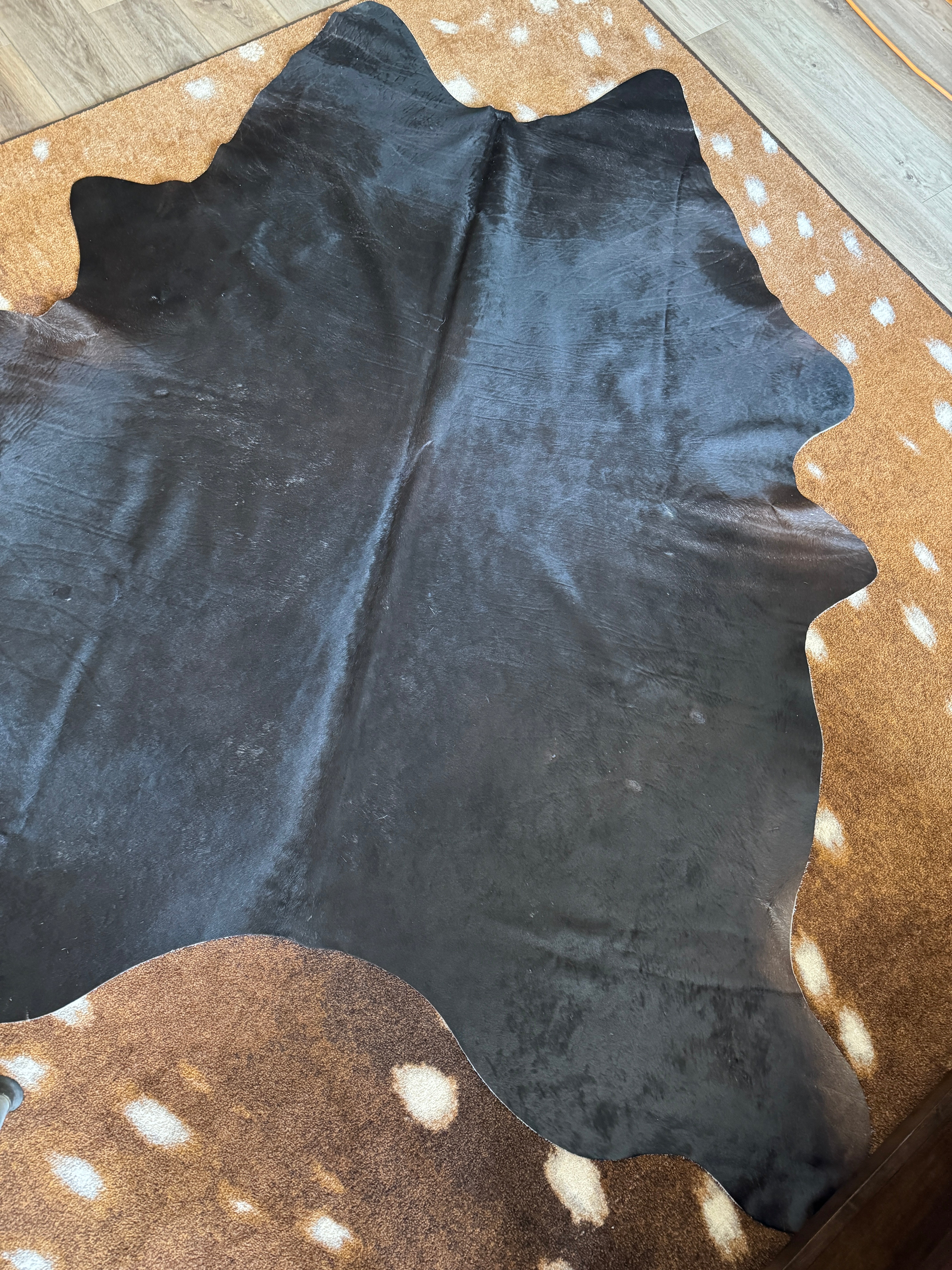Brazilian black cowhide leather rug organic shape western ranch home