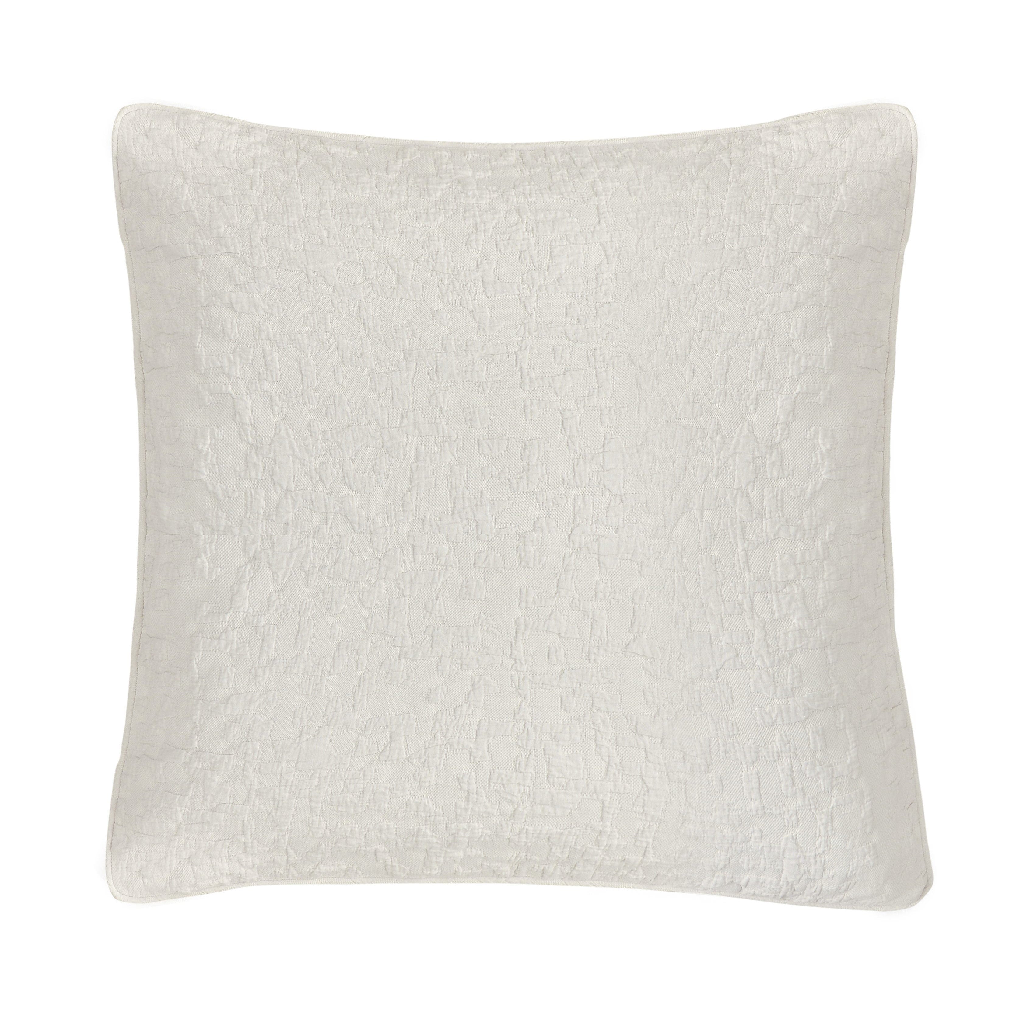 Textured white pillow on a white background