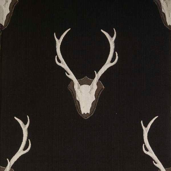 Uncle Buck staghorn upholstery fabric black background