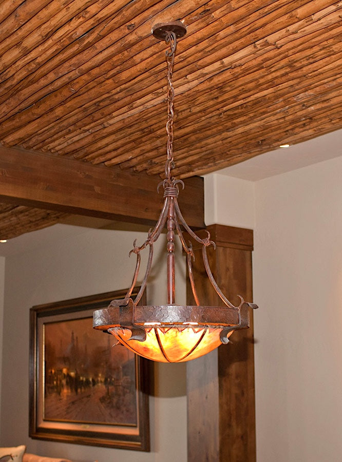 Rustic hand-forged iron chandelier with genuine handmade rawhide domein rustic themed room