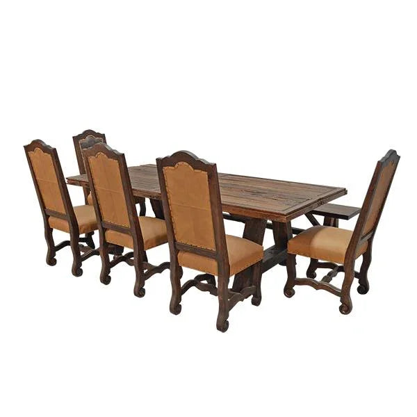 Leather Upholstered dining room chairs with wooden dining table. Your Western Decor