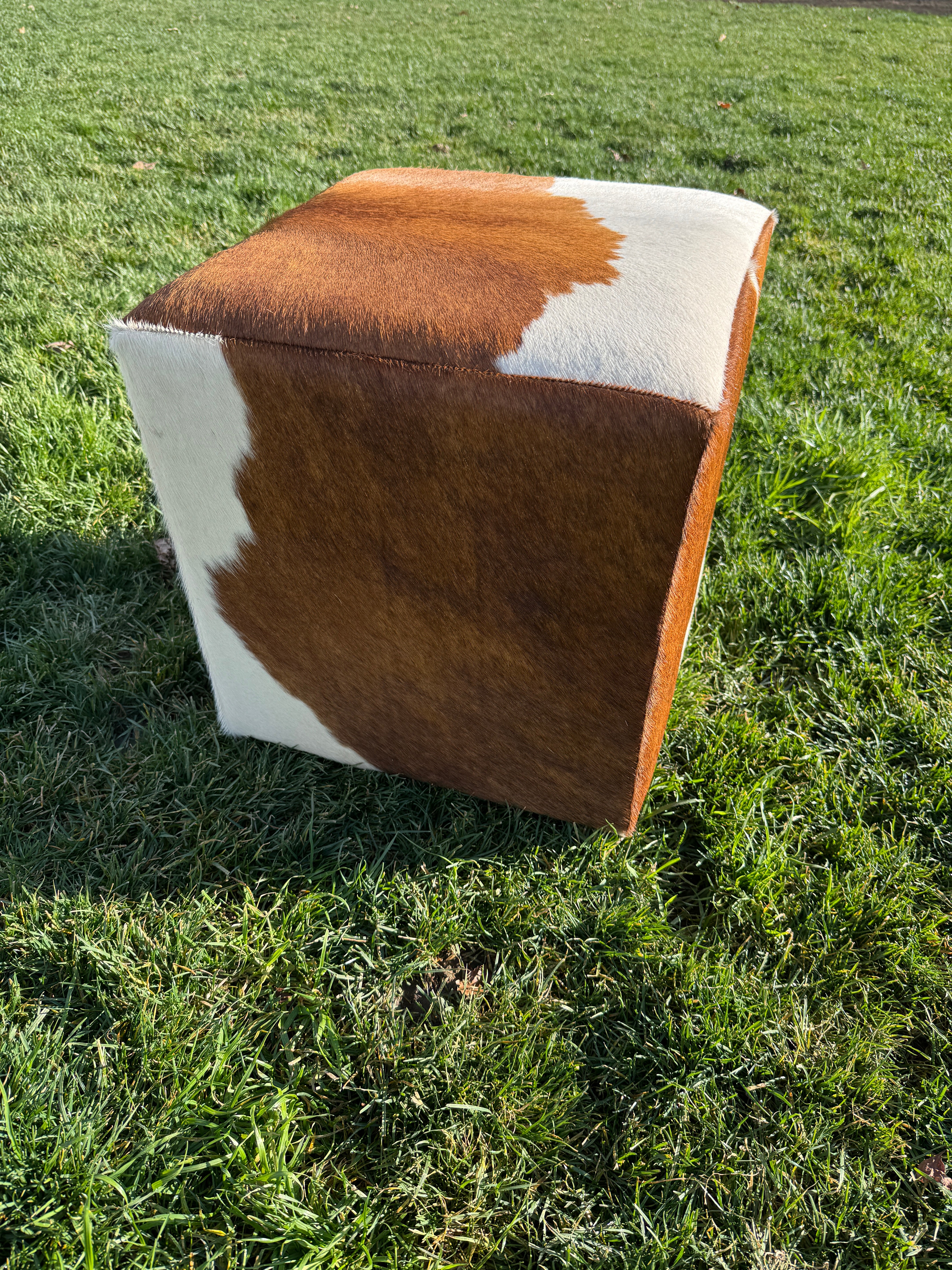 Cube footstool / ottoman in brown and white cowhide