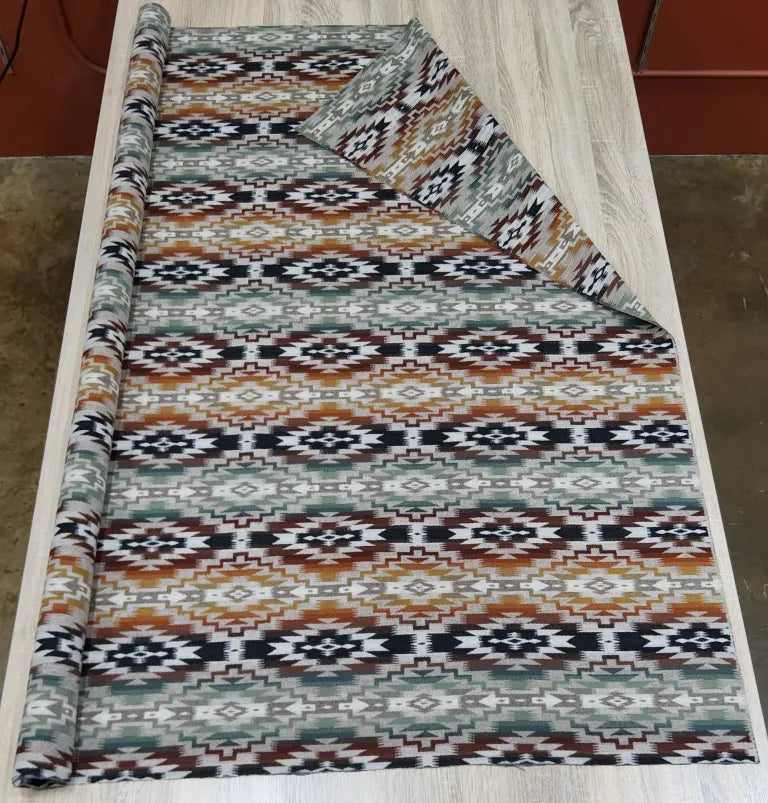 Pendleton Mesilla southwestern wool fabric with geometric diamond pattern in clay, sage green, ivory, and black, blanket-weight jacquard upholstery fabric