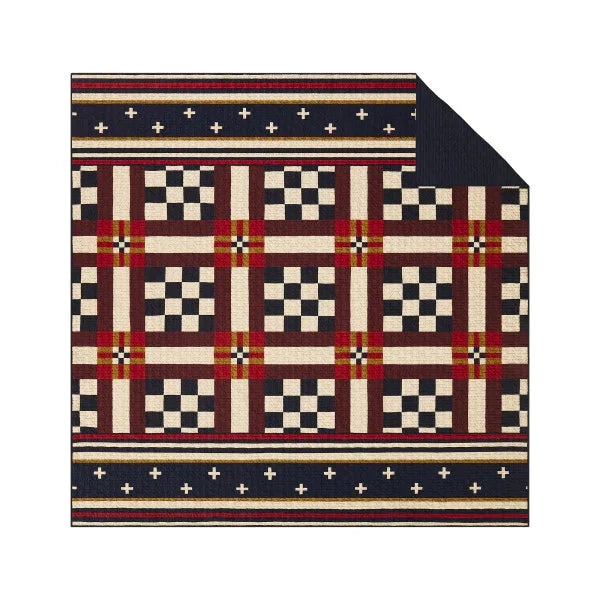 Patterned rug with geometric design on a white background