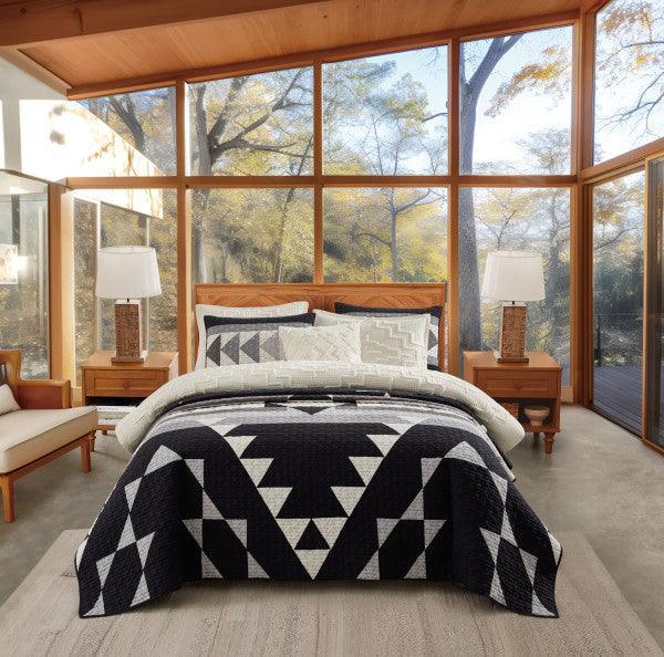 Grey and black Pendleton Shadow Peak Quilt Set with Ivory Kiva Steps Quilt set