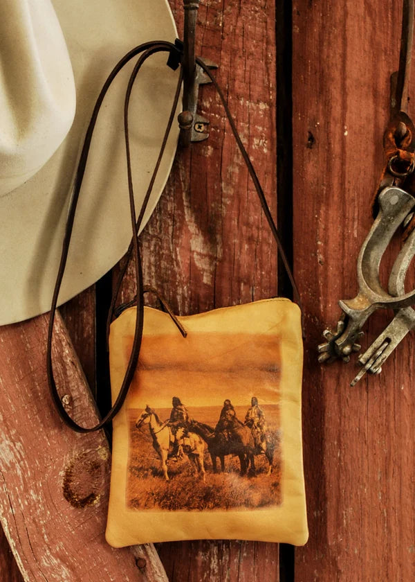 Leather pouch purse with vintage photograph. Scene shows 3 Indian Braves on their ponies, gazing across the vastness of the great high plains of the western Montana territory where the photo was taken