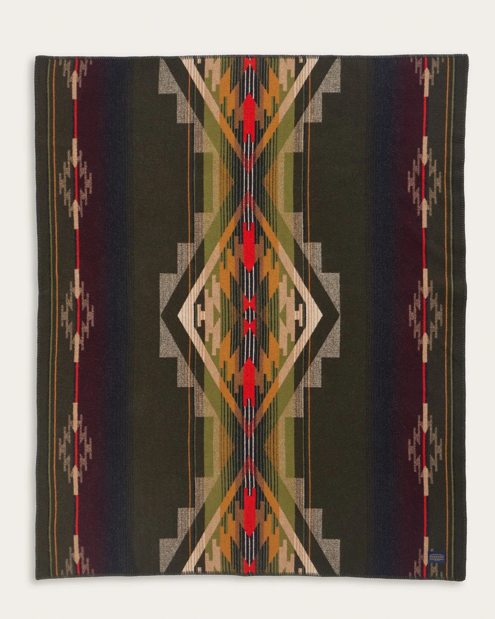 Geometric patterned blanket with a black background