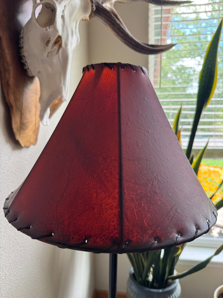 Amber round rawhide lamp shade in natural lighting