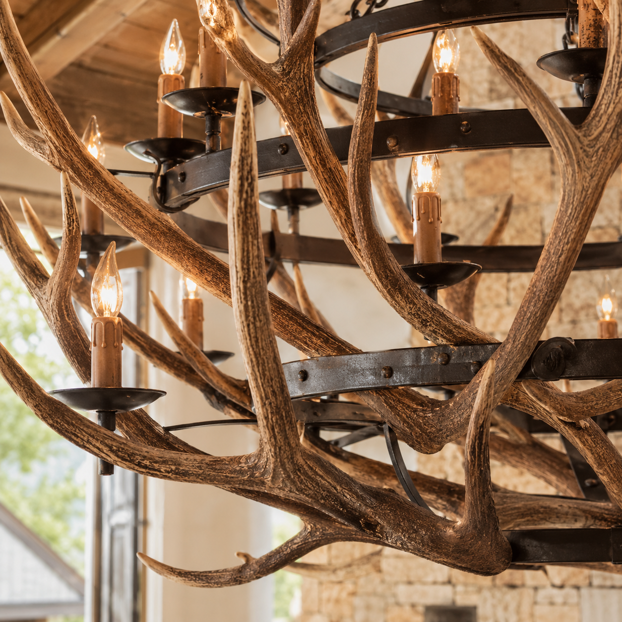 Luxury antler chandelier with hand-forged iron rings