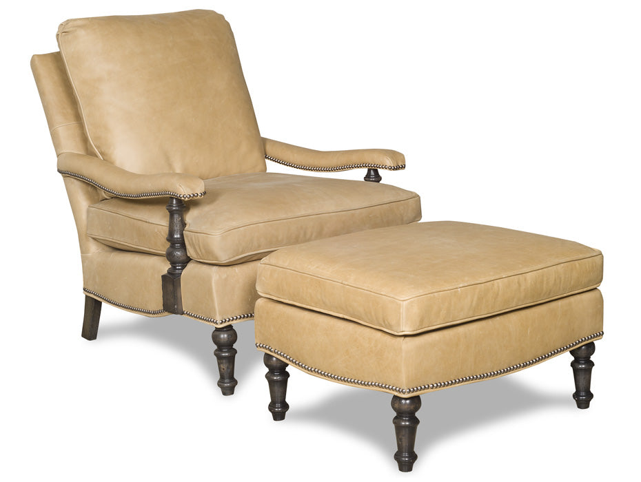 Handcrafted leather reading chair with ottoman for luxury lodge homes