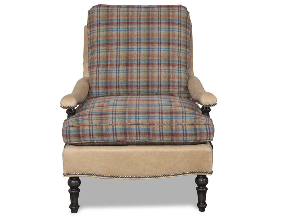 Rustic hunting lodge chair with oversized cushions and leather trim