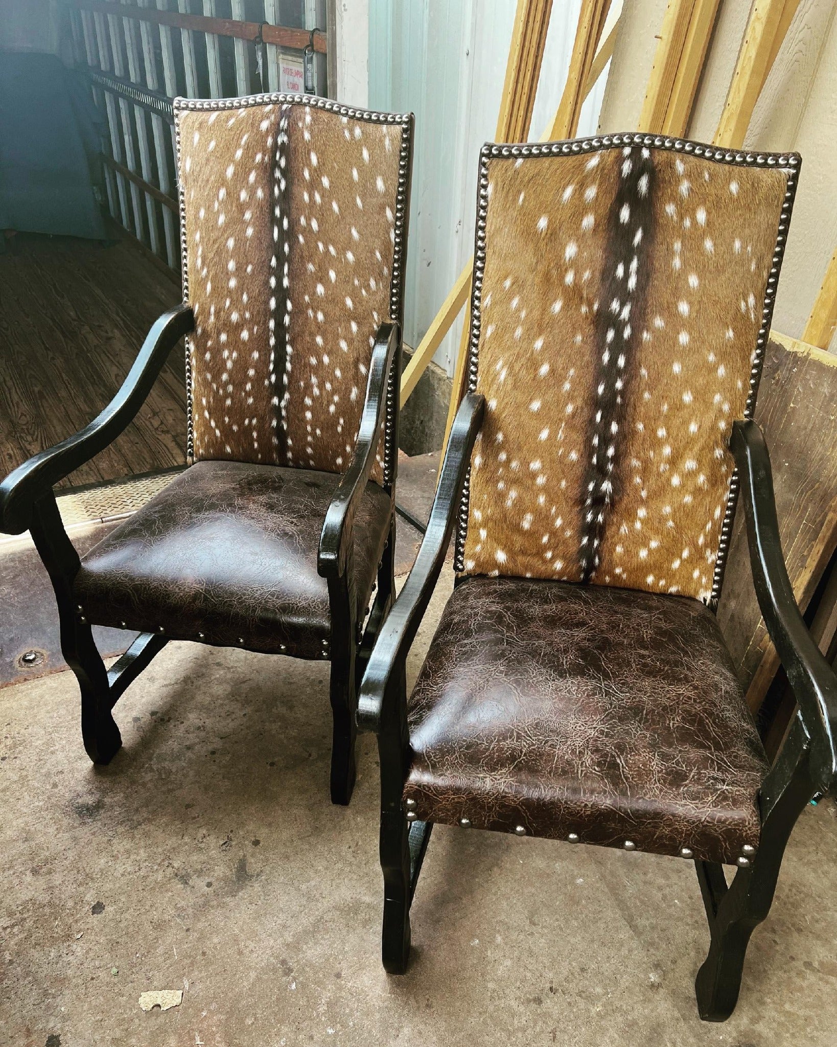 Leather and Axis deer hide dining chairs with arms