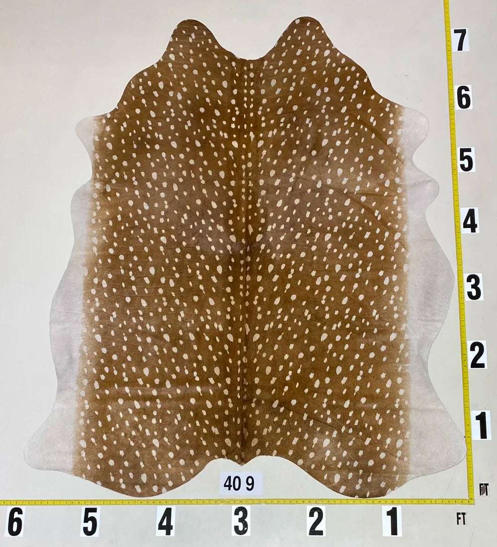 Cowhide dyed with Axis print color and white spots on Brazilian hair-on hide