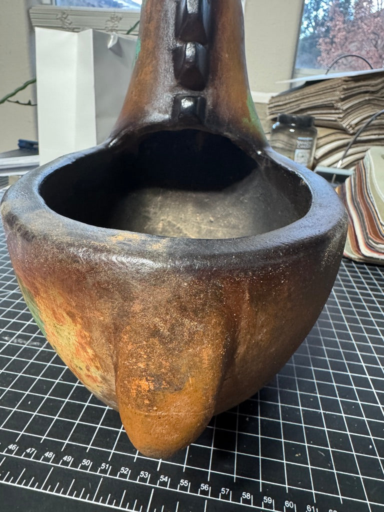back view of clay horse planter pot