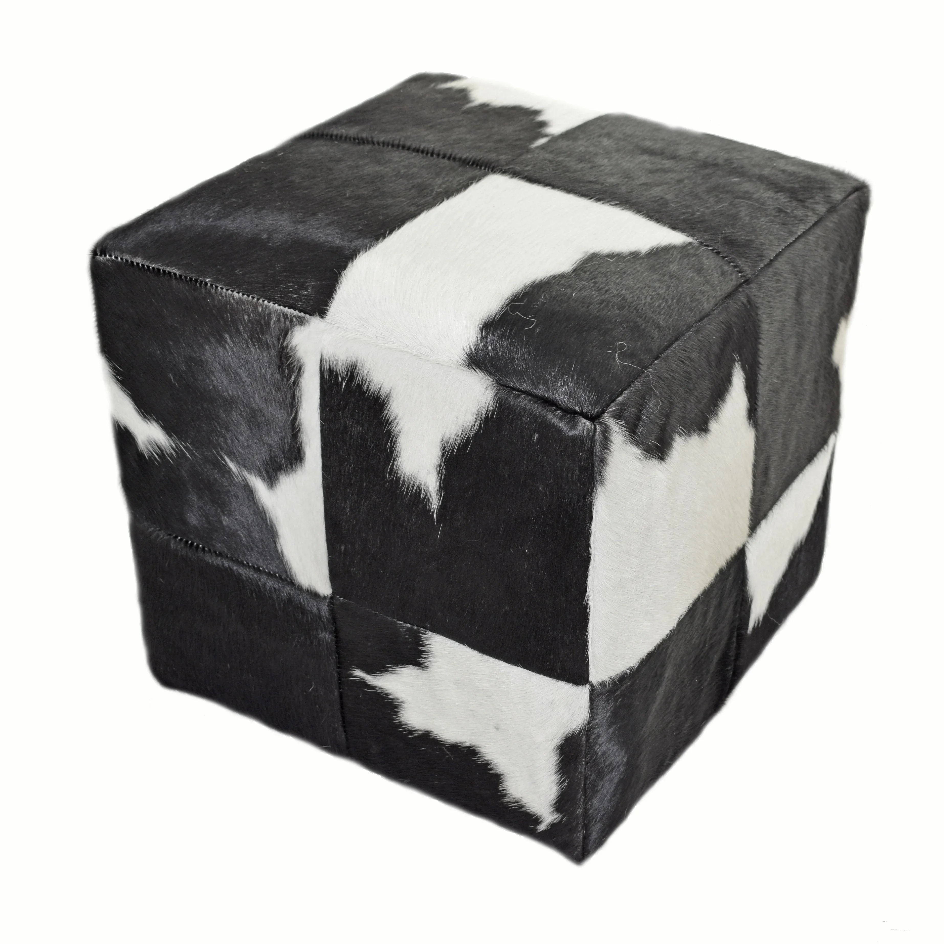 Black and white cube-shaped ottoman on a white background - Your Western Decor