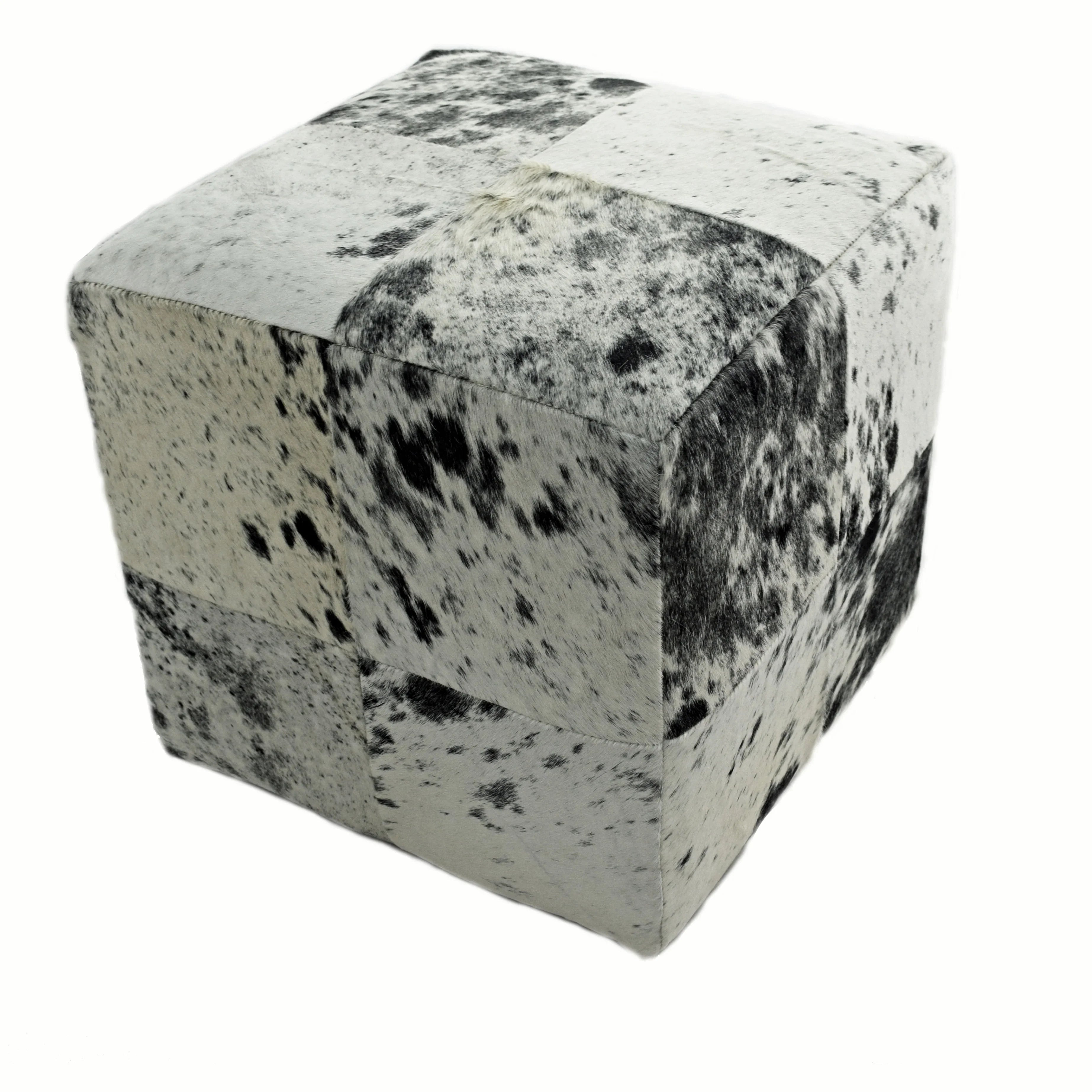 Cube-shaped ottoman with black and white speckled pattern on a white background - Your Western Decor