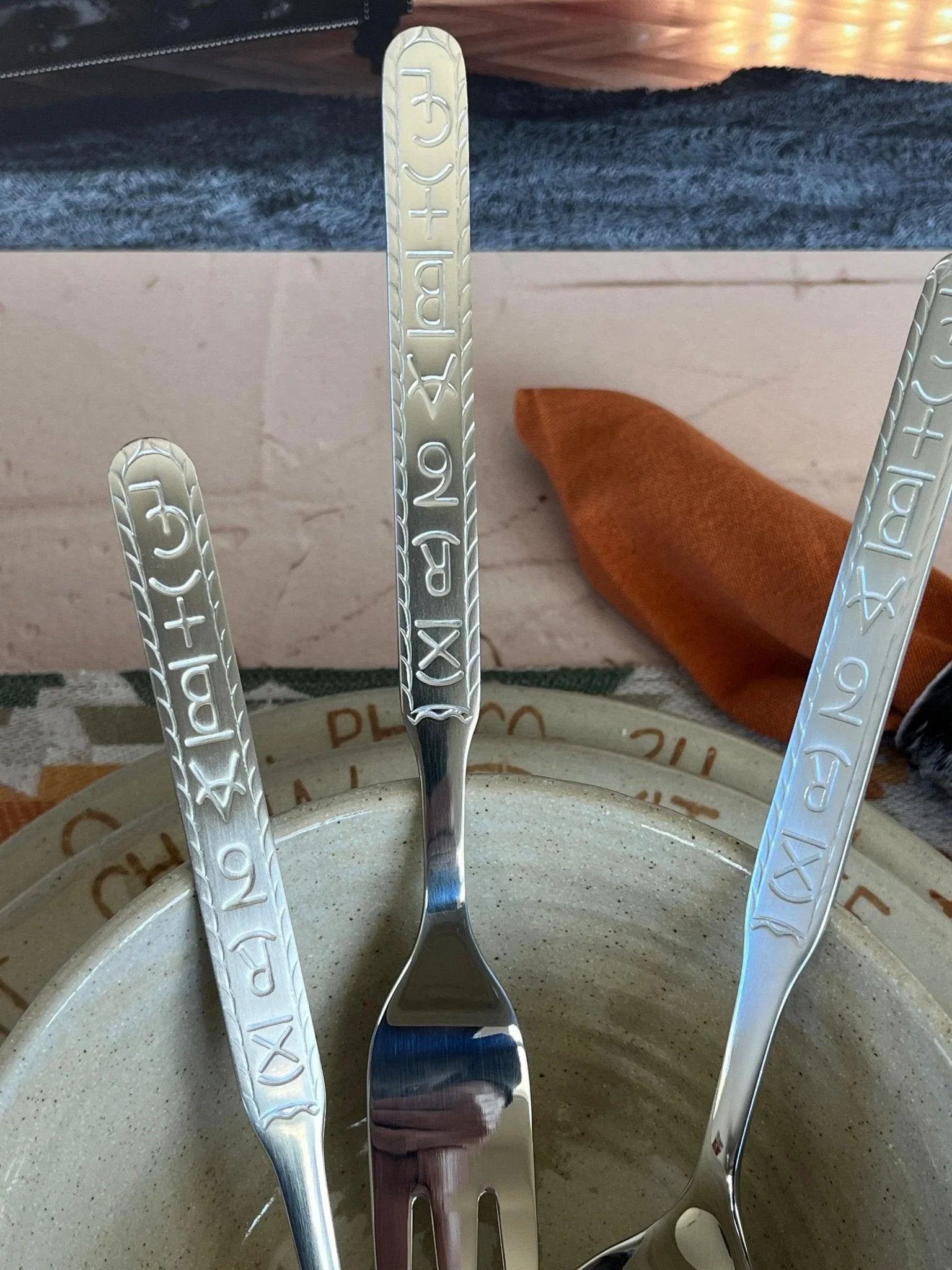 Branded handles on stainless steel serving set - Your Western Decor