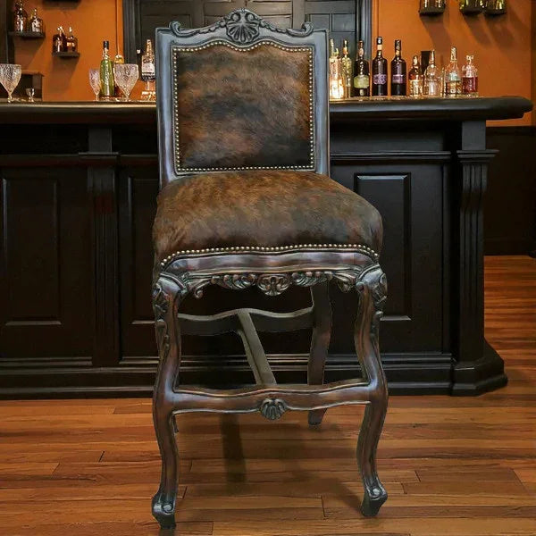 Vintage-style bar chair in a bar setting with bottles and glasses on shelves - Your Western Decor