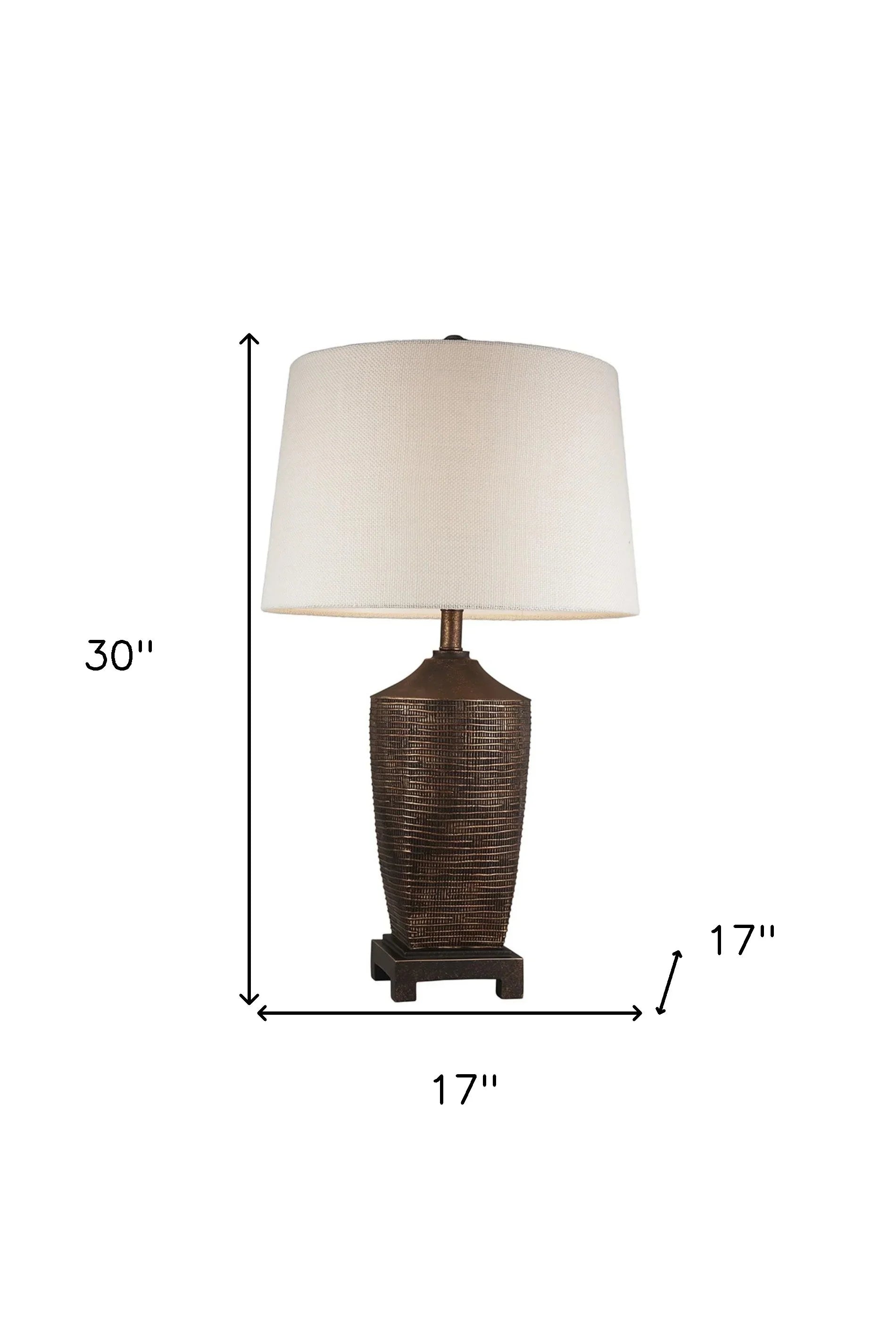 Table lamp with bronze ribbed base and off-white linen lamp shade - Your Western Decor