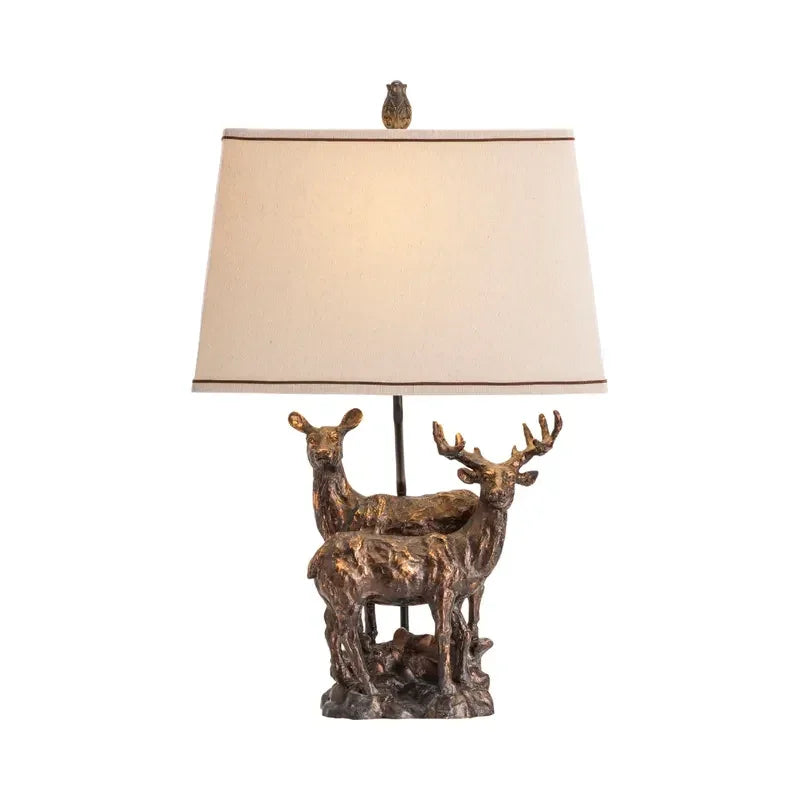 Table lamp with two deer in bronzed resin with light linen shade - Your Western Decor