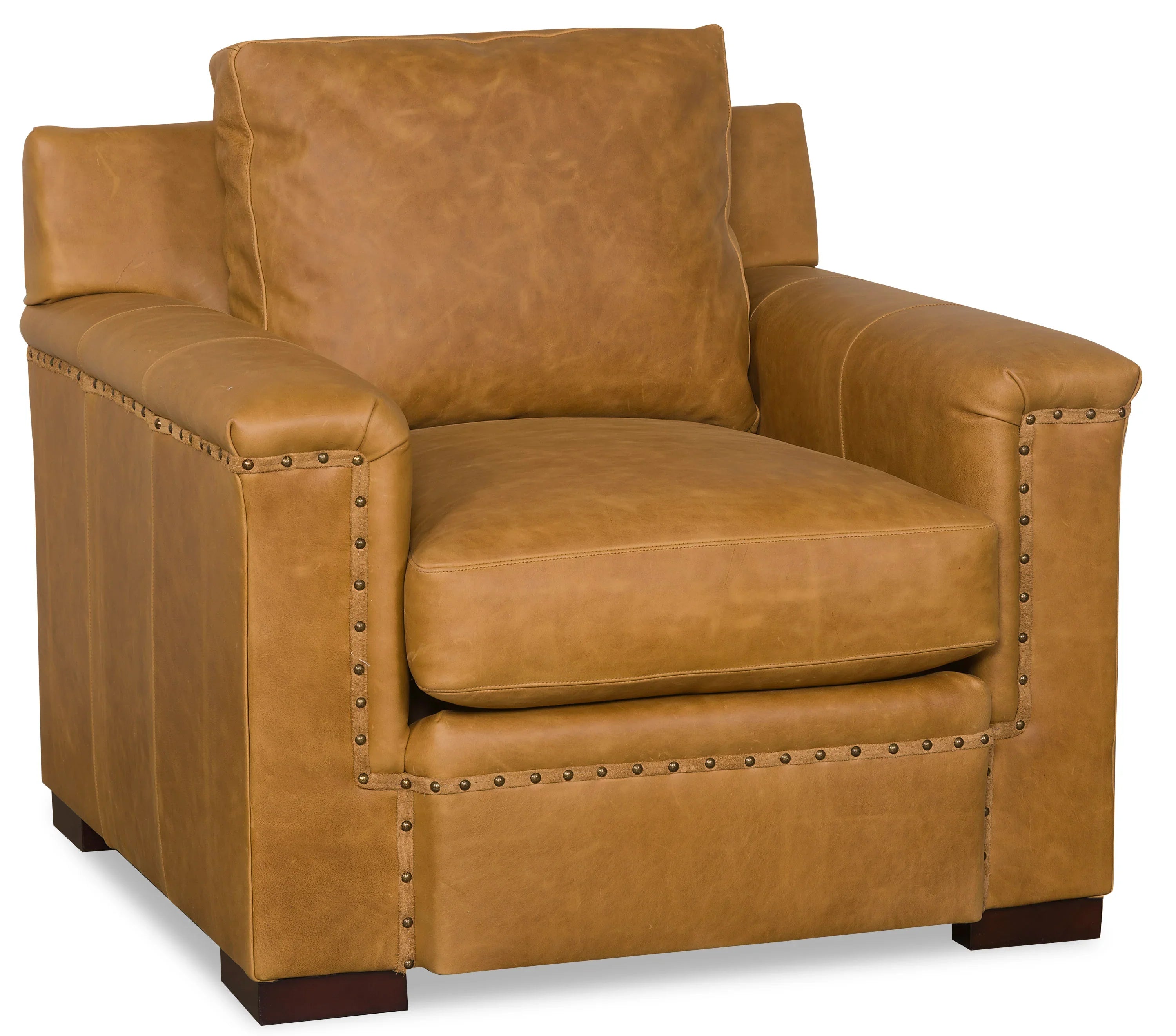 Brown leather armchair with nailhead trim on a white background. Made in the USA - Your Western Decor