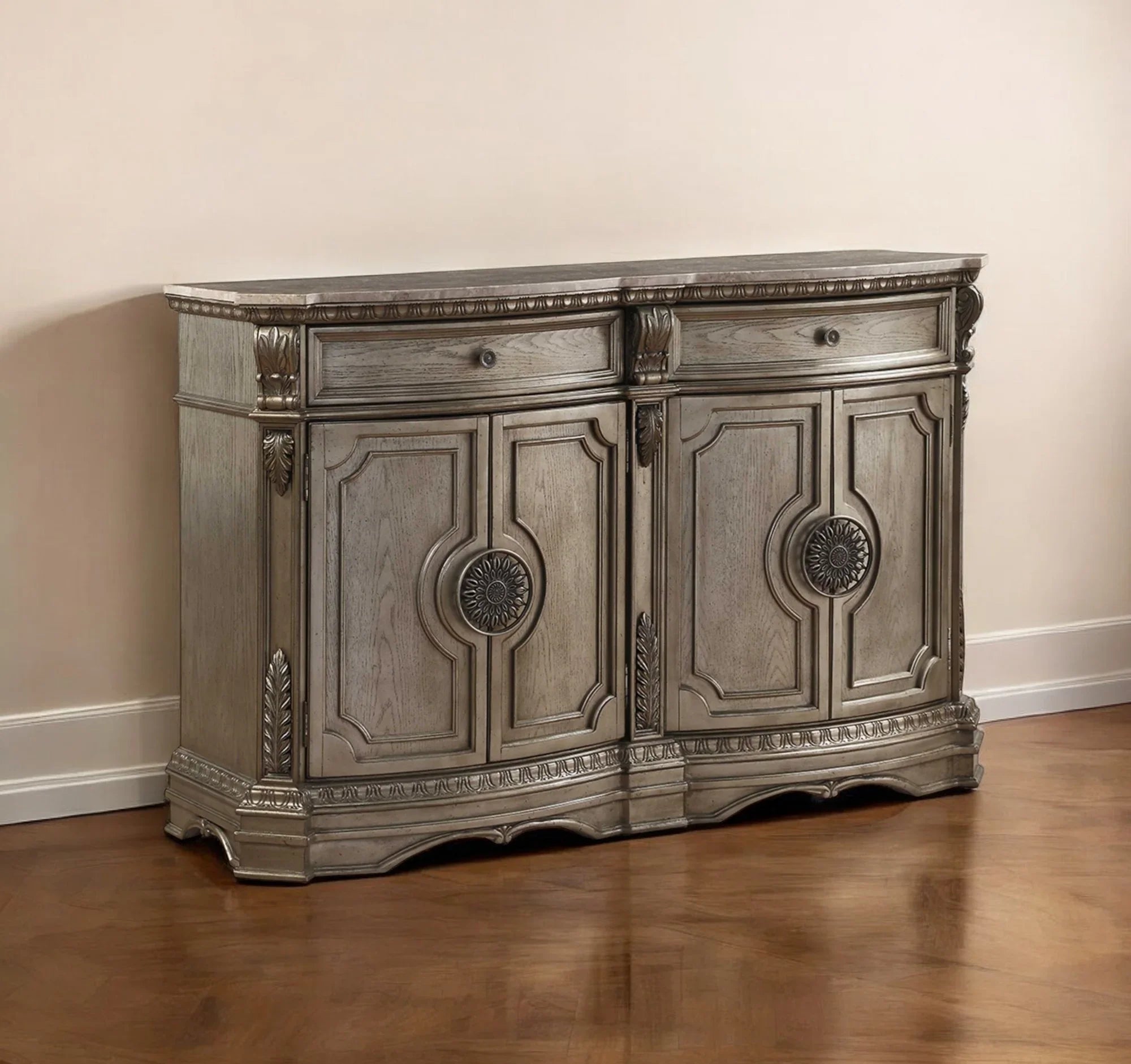 Decorative wooden sideboard with marble top against a beige wall - Your Western Decor