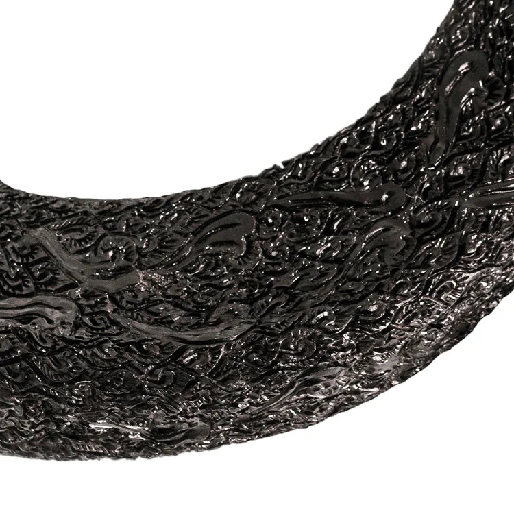 detail of carved ram horn