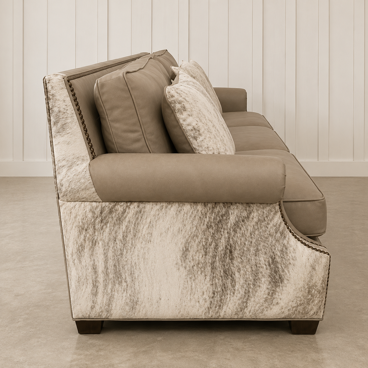 American made leather sofa featuring Cashmere grey leather, genuine brindle cowhide, and four matching cowhide pillows.