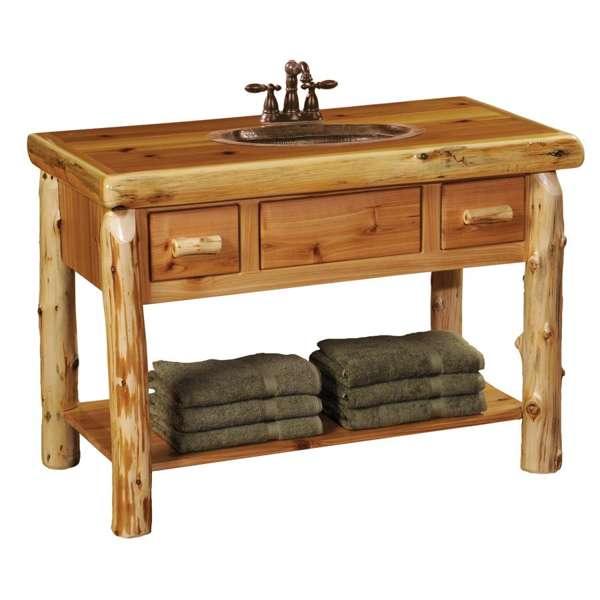Wooden bathroom vanity with sink and towels on a white background - Your Western Decor