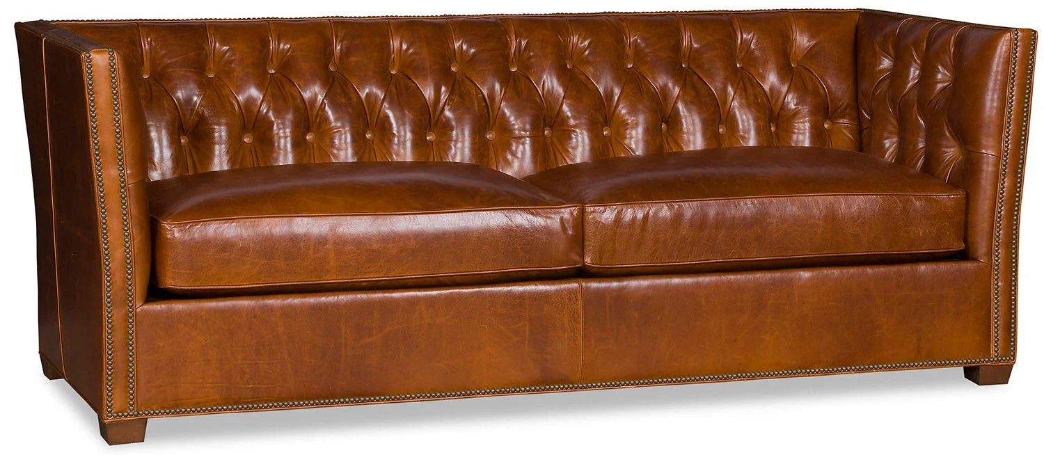 Chestnut tufted leather sofa front view - Your Western Decor