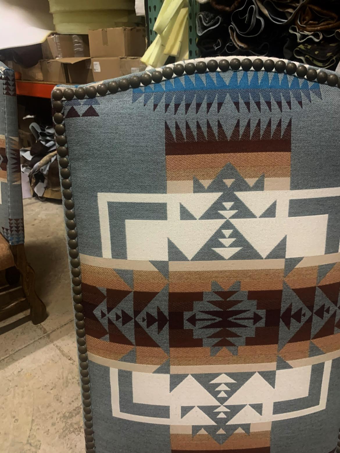 Chair with geometric pattern in a storage or warehouse setting - Your Western Decor