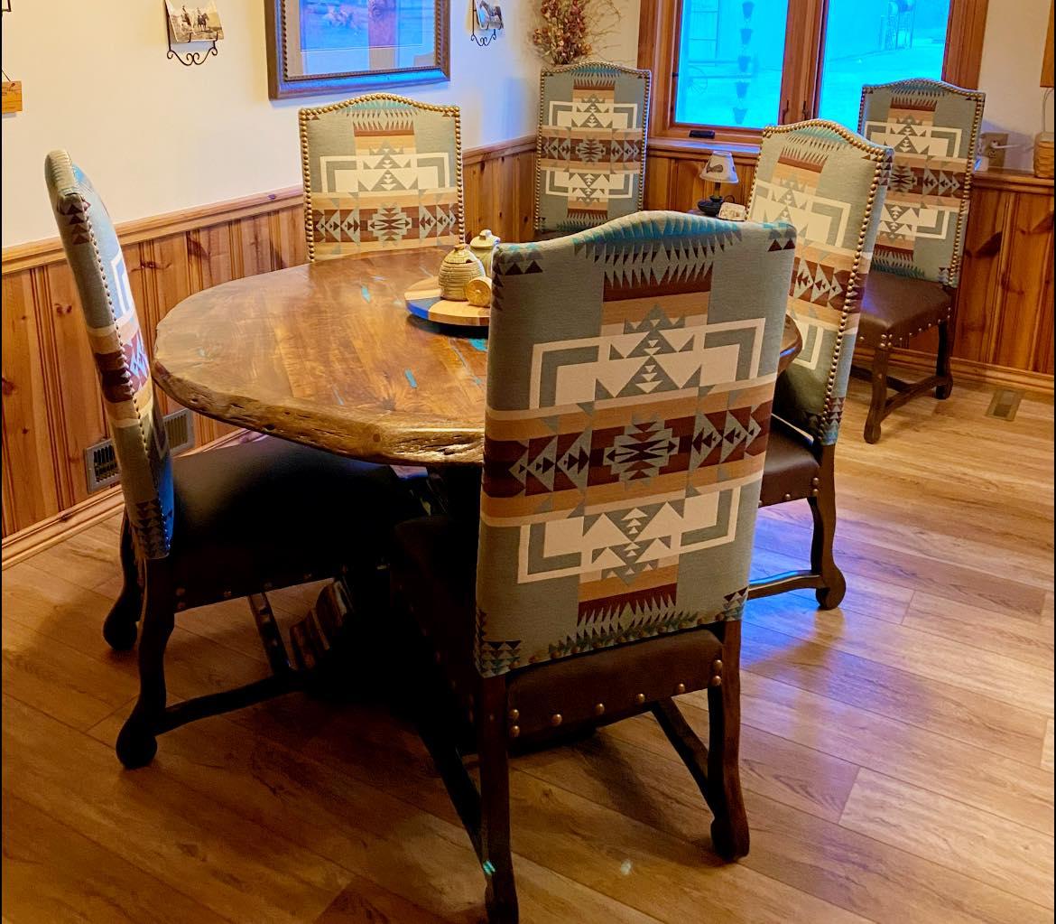 Pendleton dining chair with Chief Joseph pattern and top grain leather in western dining room setting