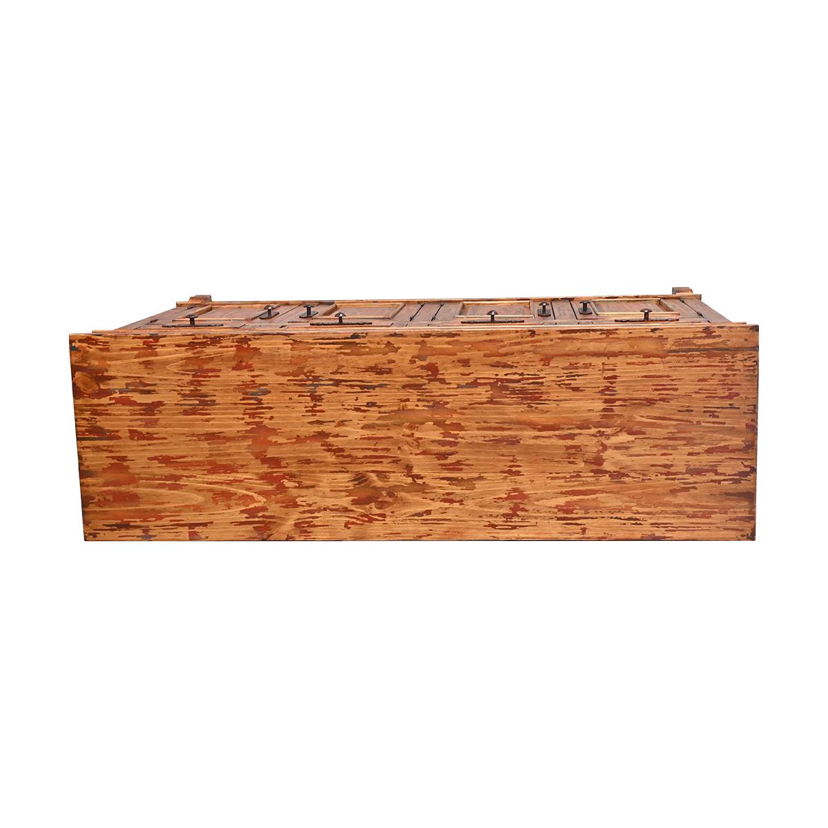 A rectangular wooden chest or box with a hinged lid, shown from the side against a plain white background.