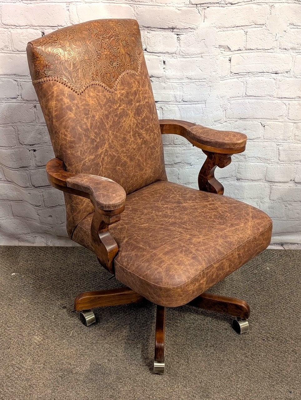 Distressed brown leather western office chair with floral embossed leather yoke