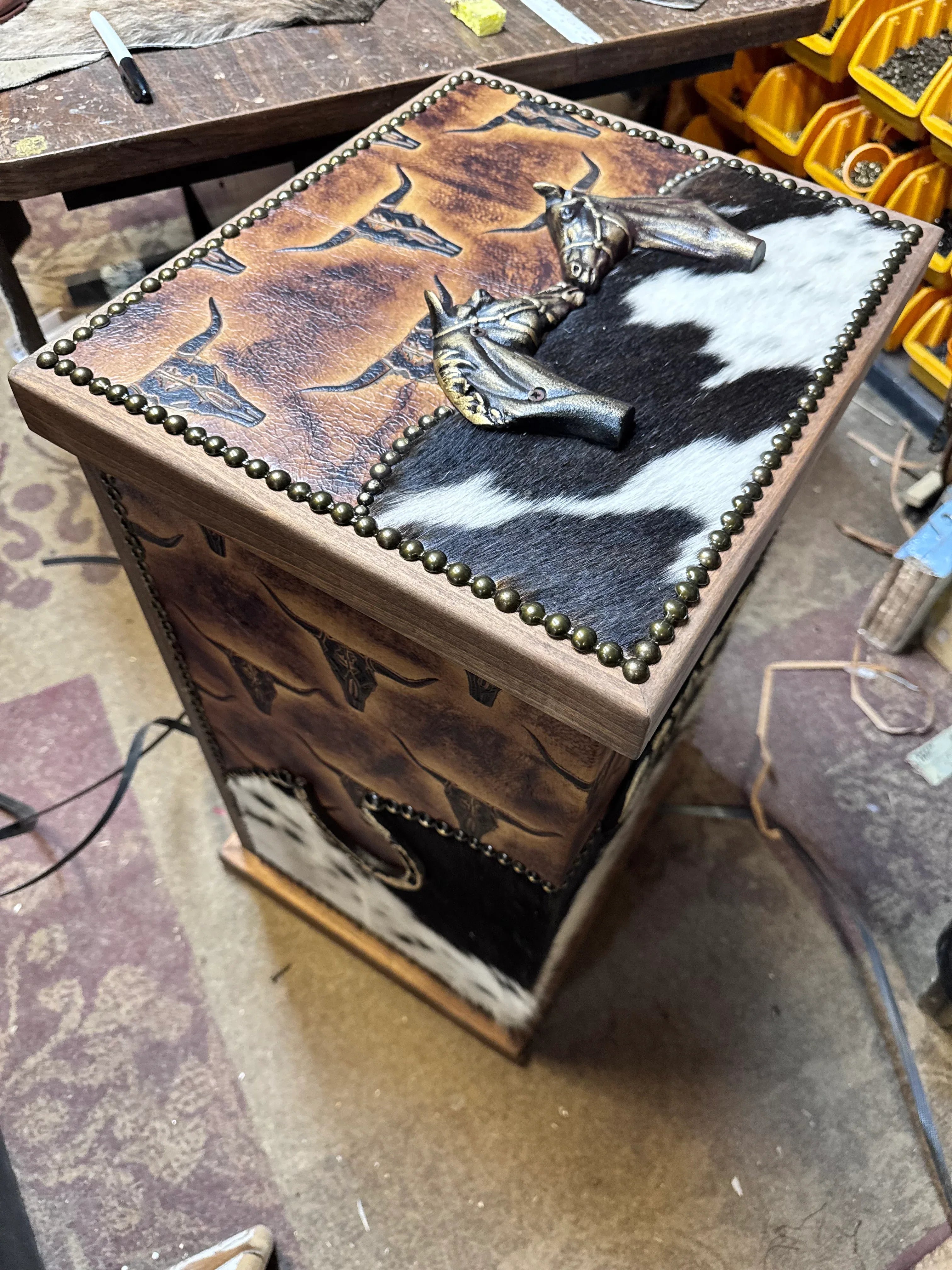 Custom designed hamper with cowhide, longhorn leather, and metal embellishments - Your Western Decor