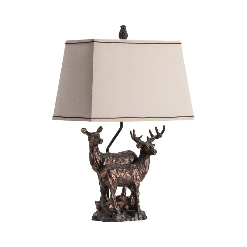 Table lamp with two deer in bronzed resin with light linen shade - Your Western Decor
