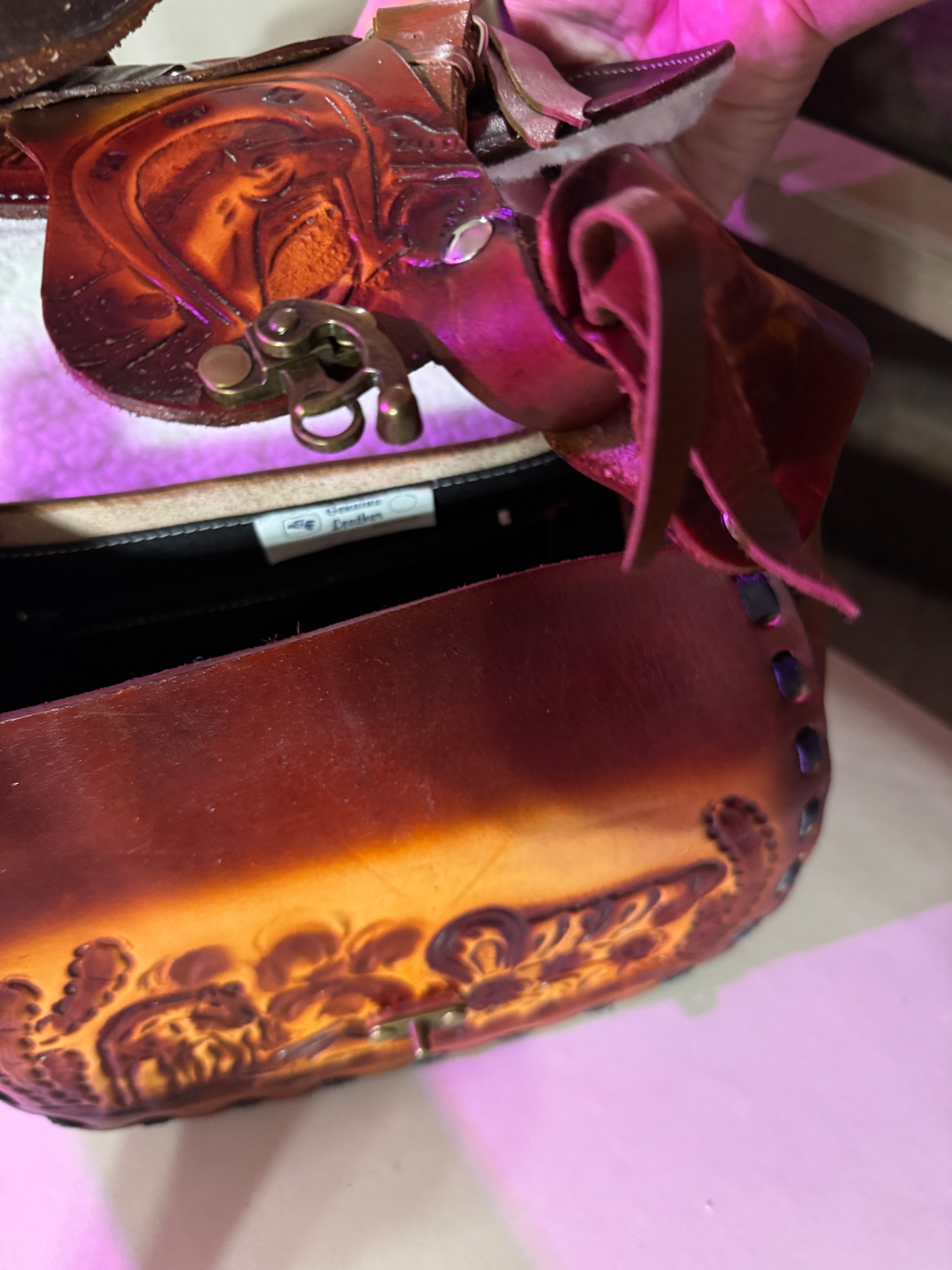 Close up of tooled leather saddle purse - Your Western Decor