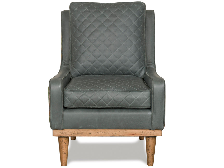 Handcrafted plaid and leather accent chair made in North Carolina