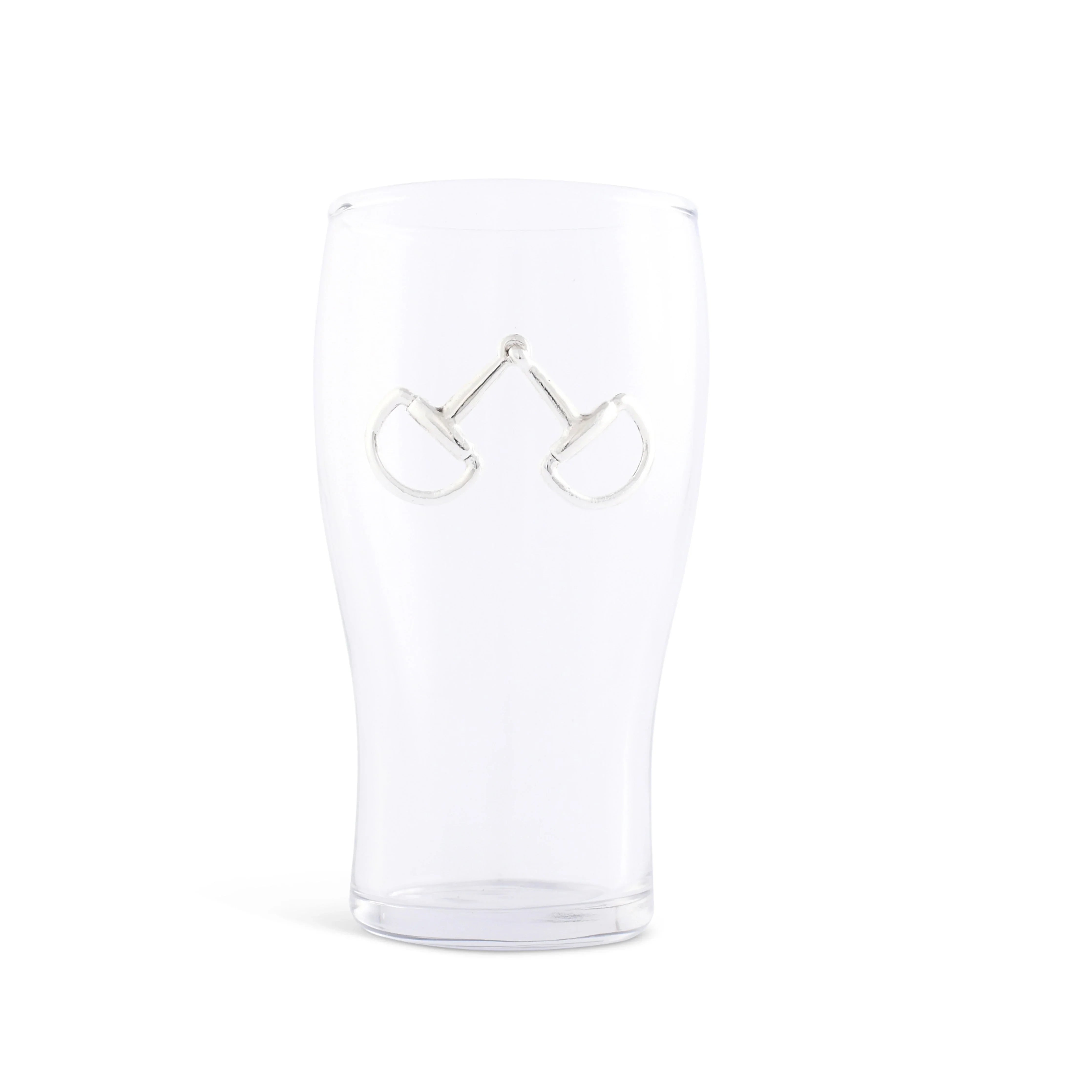Clear beer glass with silver equestrian bit medallion on a white background