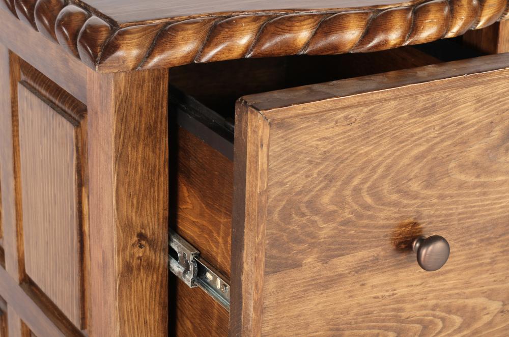 Close-up of a wood file cabinet drawer with intricate carvings - Your Western Decor