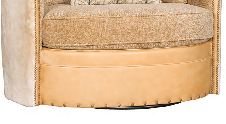 Swivel chair front detail of nail trim, leather, cowhide, fabric