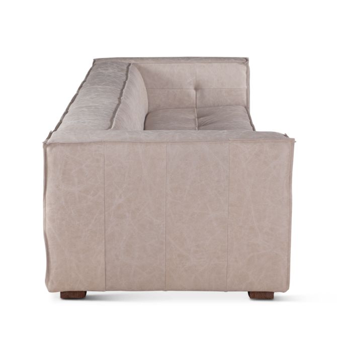 Sierra Grande leather sofa with tailored panel stitching and wide upholstered arms side view