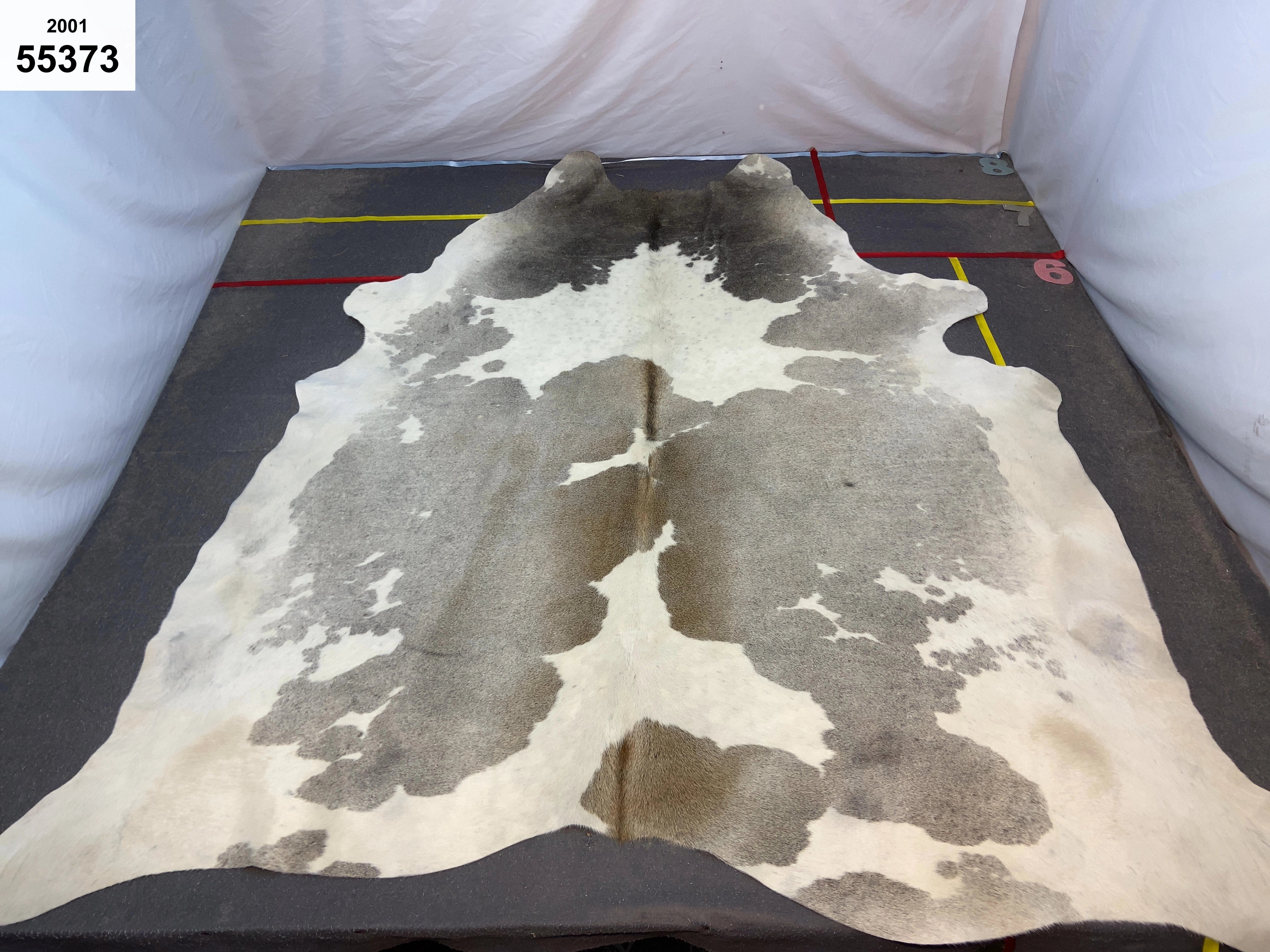 Gris tan grey and white XL cowhide rug