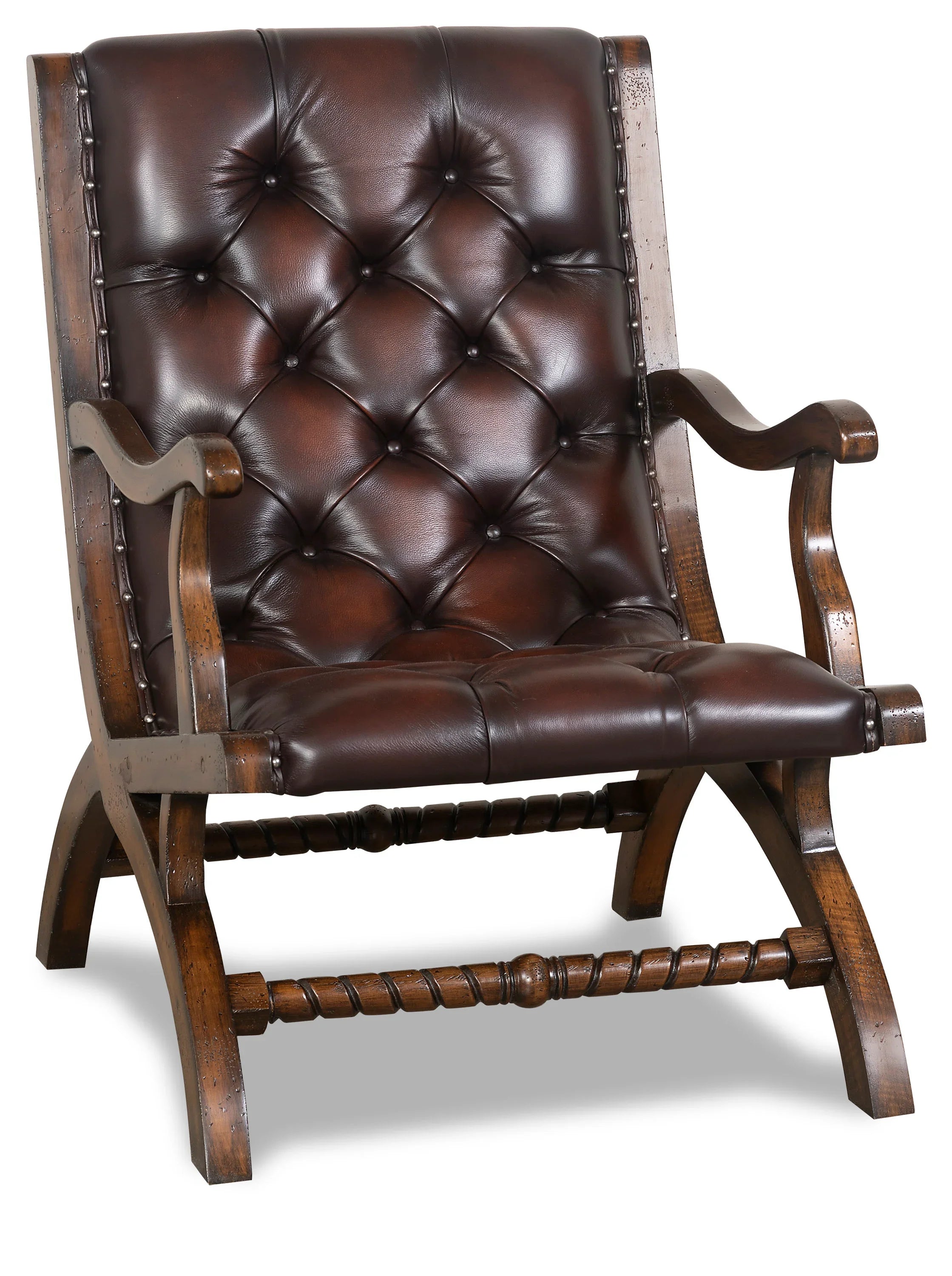 burnished leather tufted reading chair with nailhead trim and wood frame