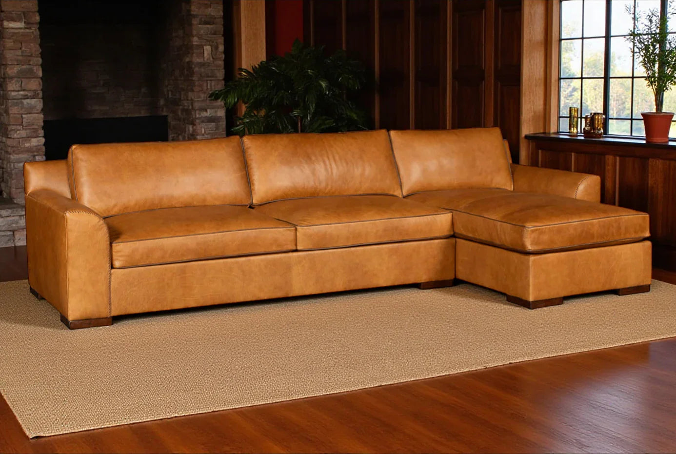 Brown leather sectional sofa in a living room setting with a fireplace and window - Your Western Decor