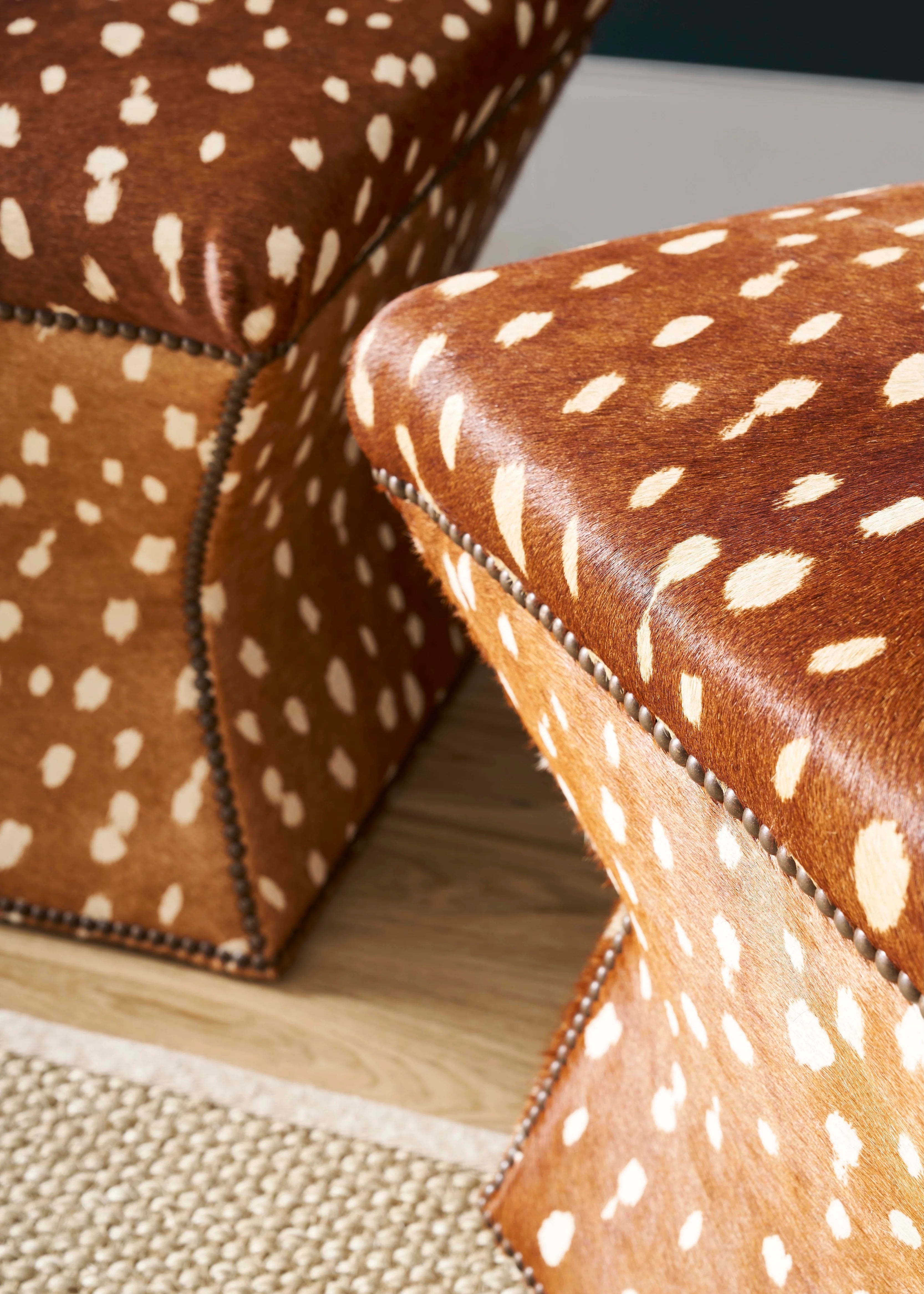 Cowhide with Axis Print design upholstered on hourglass stools