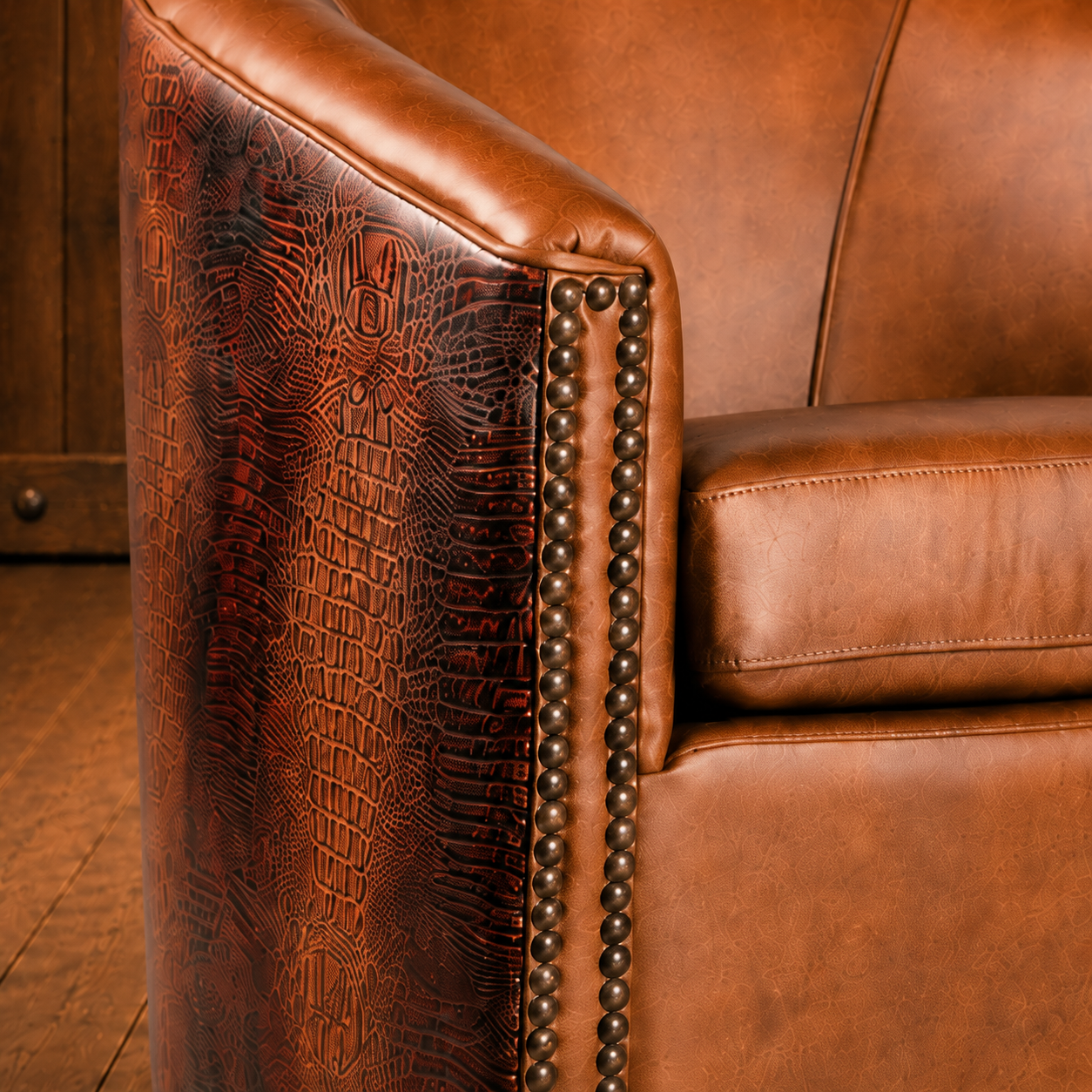 Close up of Houston croc leather swivel chair arm and leather detail